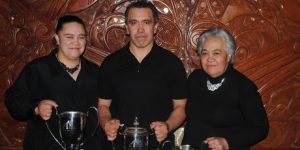 BMX LEGEND: Kevin Tamepo (centre) with all his trophies from the Turangi Sports Awards 2013, a proud moment for mum, Emily (right) and sister Marama (left). 