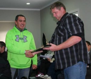 Kevin receives his Life Member Award from Club President Darryll Ranford